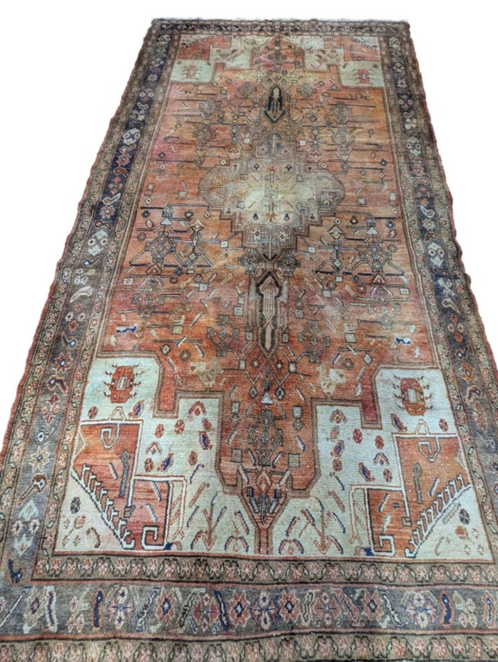 Bijar Hand-Knotted Rug, 5 ft 2 in x 10 ft 4 in: Persian Bijar Hand-Knotted Rug, 5 ft 2 in x 10 ft 4 in An antique Persian Bijar hand-knotted rug featuring a large elongated geometric medallion on a warm rust-red field, accented by ivory corner span