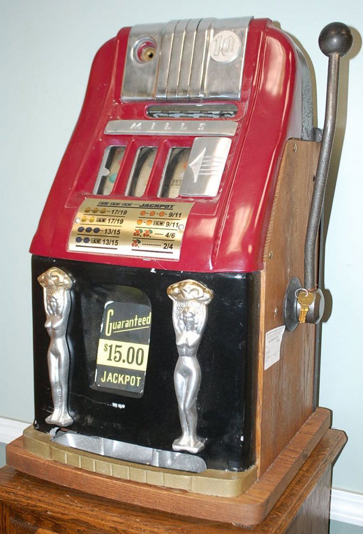 RESTORED VINTAGE 10CENT SLOT MACHINE: CASE HAS BEEN RESTORED, MECHANISM IN WORKING ORDER, ANY PARTS THAT NEEDED REPLACING HAVE BEEN DONE