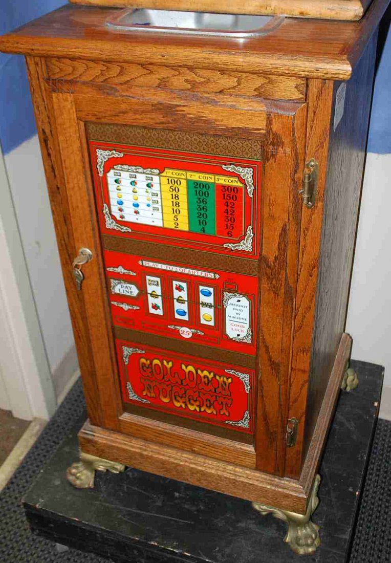 OAK GOLDEN NUGGET SL;OT MACHINE STAND: GLASS FRONT WITH CLAW FEET