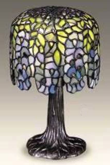 LTD ED Wisteria Shade Tiffany Lamp: Attributed to Tiffany. *Wisteria Shade w/Tree Trunk Base *5"W x 11"H *1 x 40W Candelabra *Antique Bronze Finish **LIMITED EDITION... 2000 pcs