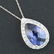 1055: Lab Sapphire Tear Drop Pend w/ Chain in 10KW