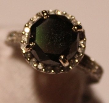 Black & White Diamond Ring - 6.47 Carat Total Wgt.: 14k White Gold - 5.49 ct Black Diamond with .98 ctw of White Diamonds - Clarity is I1-I2 Overall and Color is H-I - Appraised Value $11,182.00 - Includes Appraisal (JK0149)