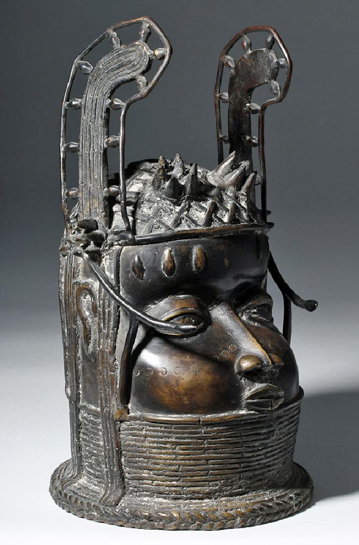 African Benin Bronze Altar Choker Head of an Oba (King): Back at auction due to non-paying bidder Africa, Nigeria, Edo, Court of Benin, ca. mid 19th to early 20th century CE. An impressive bronze cast "choker" head depicting an Oba (king of Benin) wearing a