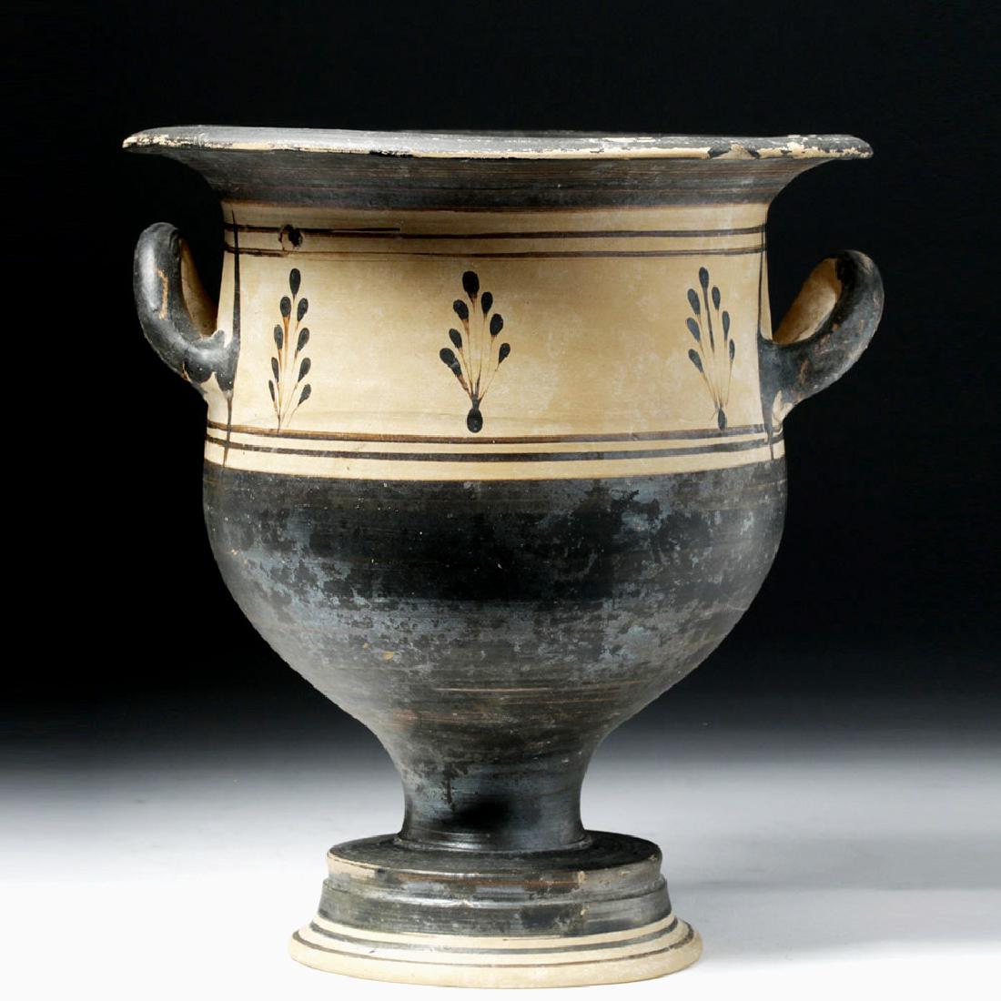 Greek South Italic Earthenware Bell Krater: Magna Graecia, South Italic colonies, ca. 4th century BCE. A bichrome pottery bell krater, a vessel used for mixing water and wine, of a traditional form with upraised twin loop handles emerging from