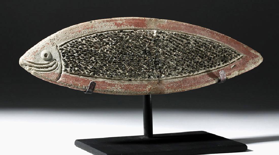 Published La Tolita Fish-Form Pottery Grater: Pre-Columbian, Colombia, La Tolita, Tumaco, ca. 500 BCE to 500 CE. Effigy graters (rollador) were utilized in the Tumaco region of what is now Colombia, by the Tolita culture, oftentimes taking the at