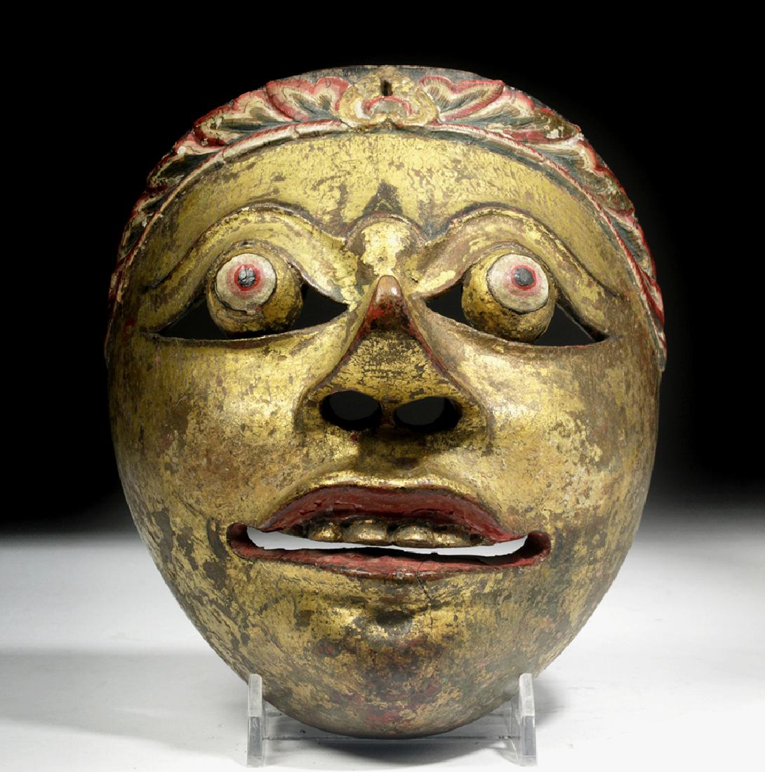 Early 20th C. Indonesian Painted Wood Festival Mask: Indonesia, Java, early 20th century CE. A hand carved and hand painted dramatic wood mask depicting Klana, a character of the Babakan Topeng in which he is used in a series of solo Javanese dances. Th