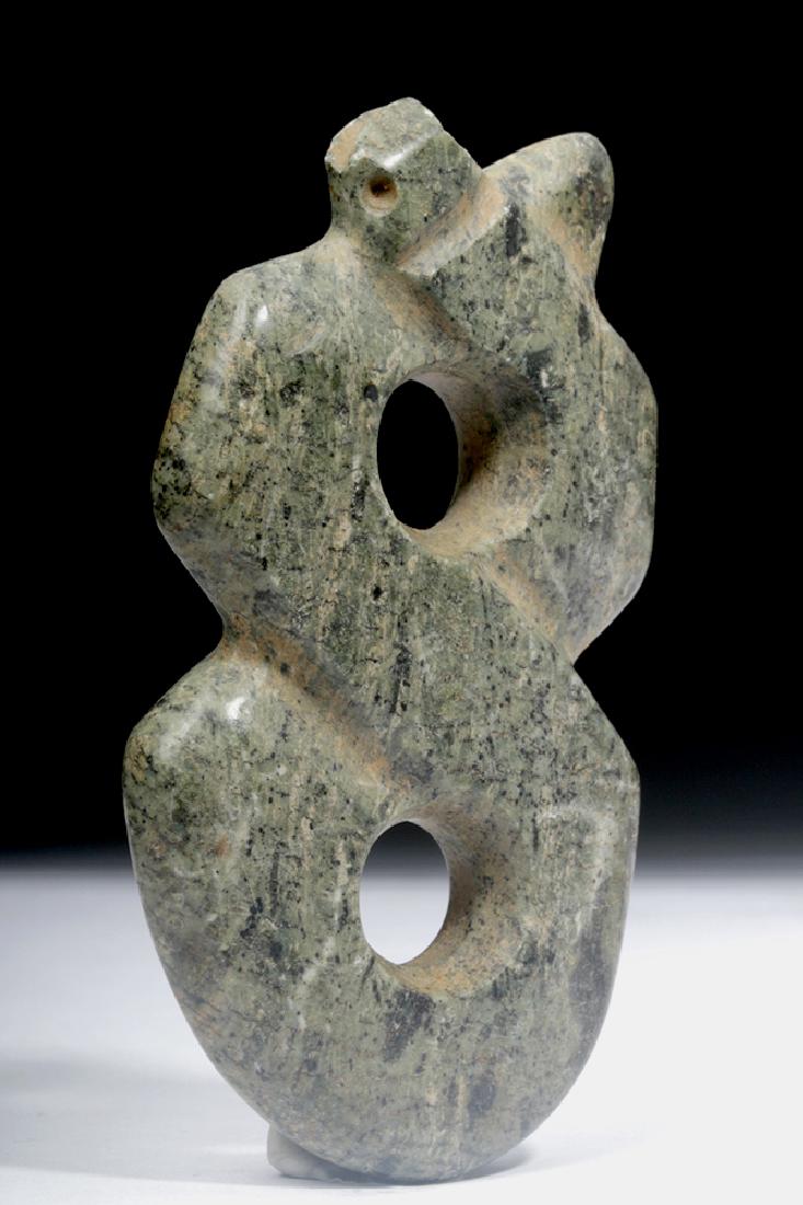 Guerrero Greenstone Snake Pendant: Pre-Columbian, Mexico, Guerrero, Mezcala culture (Balsas culture), ca. 700 to 200 BCE. A pretty, rare form of greenstone pendant from this culture, which is famous for its abstract greenstone carvings