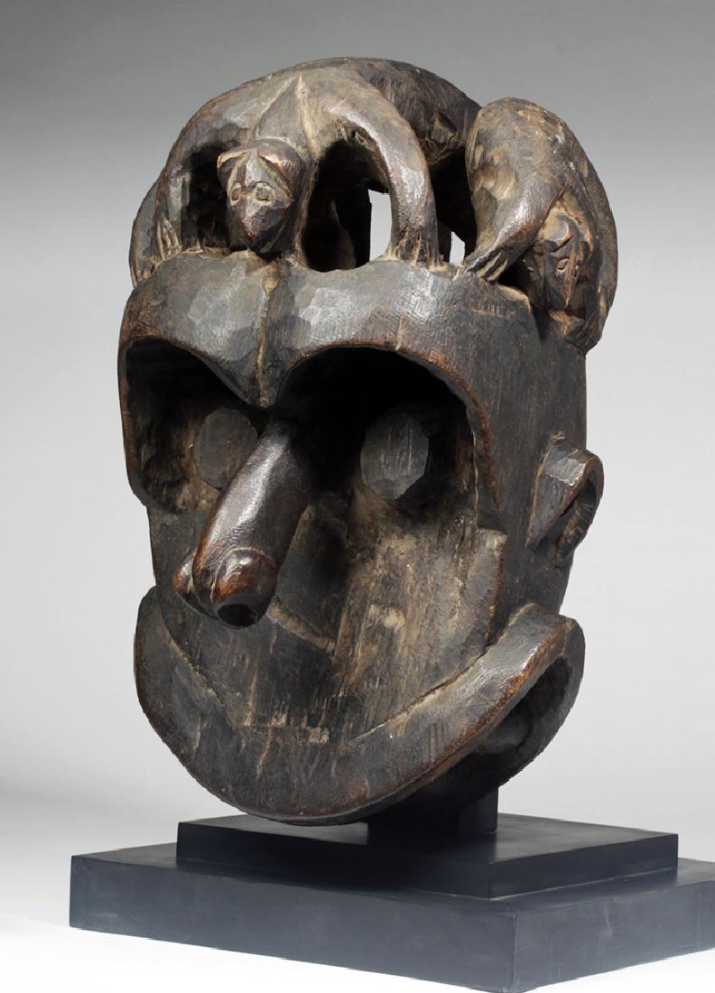 20th C. African Helmet Mask w/ Phallic Nose ex-Bonham's: **Originally Listed At $1200** Africa, Cameroon, Kom (Bekom) people, mid-20th century CE. This is a delightful mask made by the Kom people. Its most striking features are its enormous, phallic nose an
