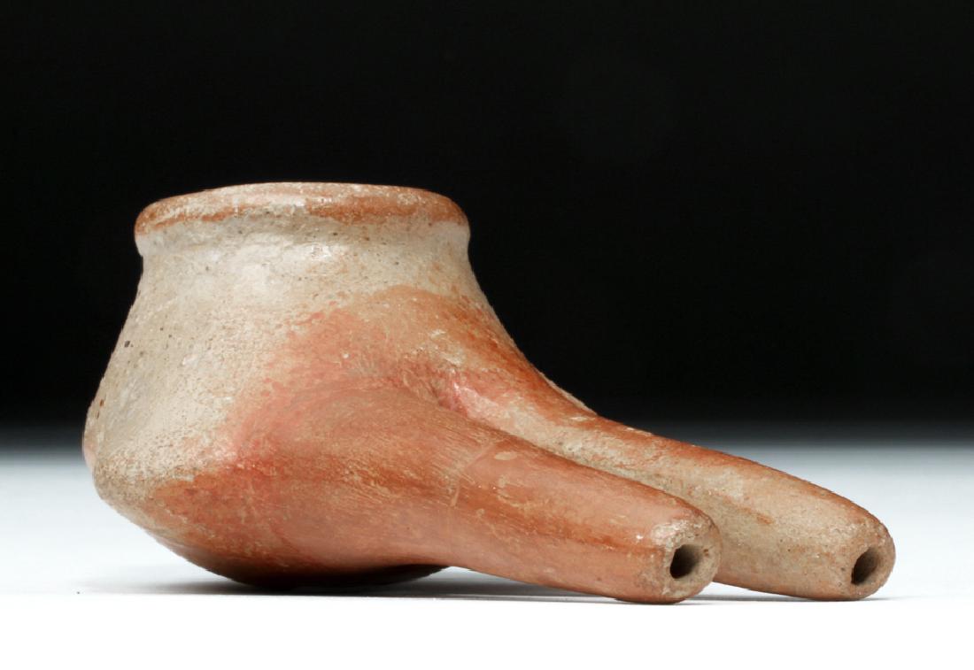Colombian Pottery Drug Inhaler: **First Time At Auction** Pre-Columbian, Colombia, ca. 1000 to 1500 CE. A bi-chrome terracotta tool for inhaling hallucinogenic substances, the form consisting of a bowl at one end with protruding tri