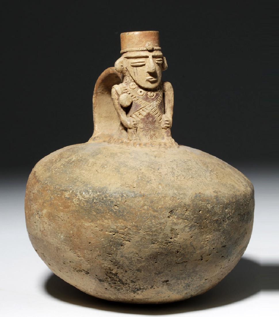 Colombia Muisca Spouted Jar w/ Dignitary (Cacique): **Originally Listed At $500** Pre-Columbian, Colombia, Muisca culture, ca. 1200 to 1538 CE. A cream-colored spouted jar with dark red pigment details over the terracotta. The spout is in the form of a
