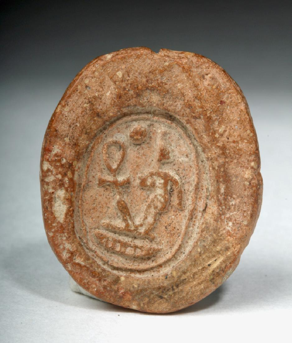 Egyptian Terracotta Seal Mold - Amenhotep III: Egypt, New Kingdom, Eighteenth Dynasty, ca. 1391 to 1351 BCE. A terracotta seal mold bearing a royal name. Molds like this one were used to make the inscribed base for a faience scarab. Inscribed on t