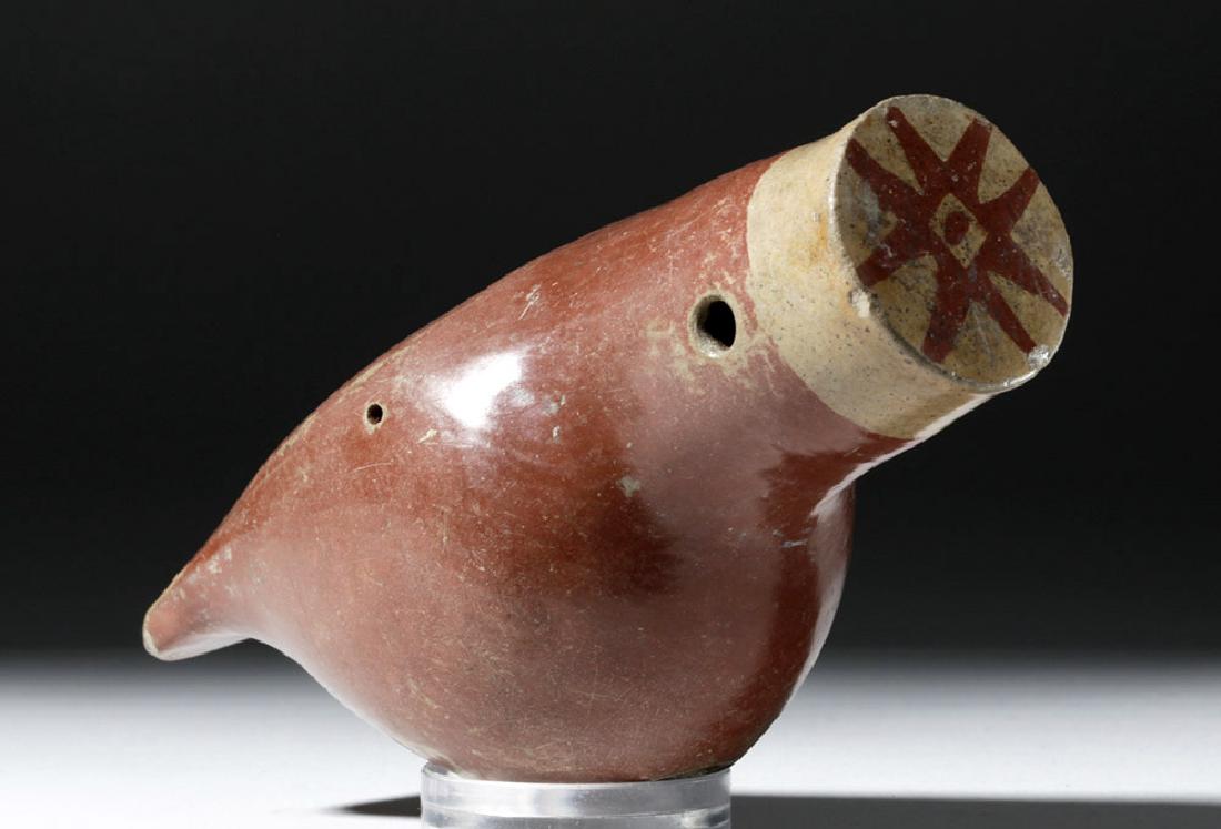 Wonderful Narino Bichrome Flute w/ Fox and Star: Donated By: Donick Cary, Emmy-Award winning writer/producer (Letterman /Simpsons / Parks and Recreation /Silicon Valley) Pre-Columbian, Colombia, Narino, ca. 1250 CE. Beautiful and musical too, a Nari