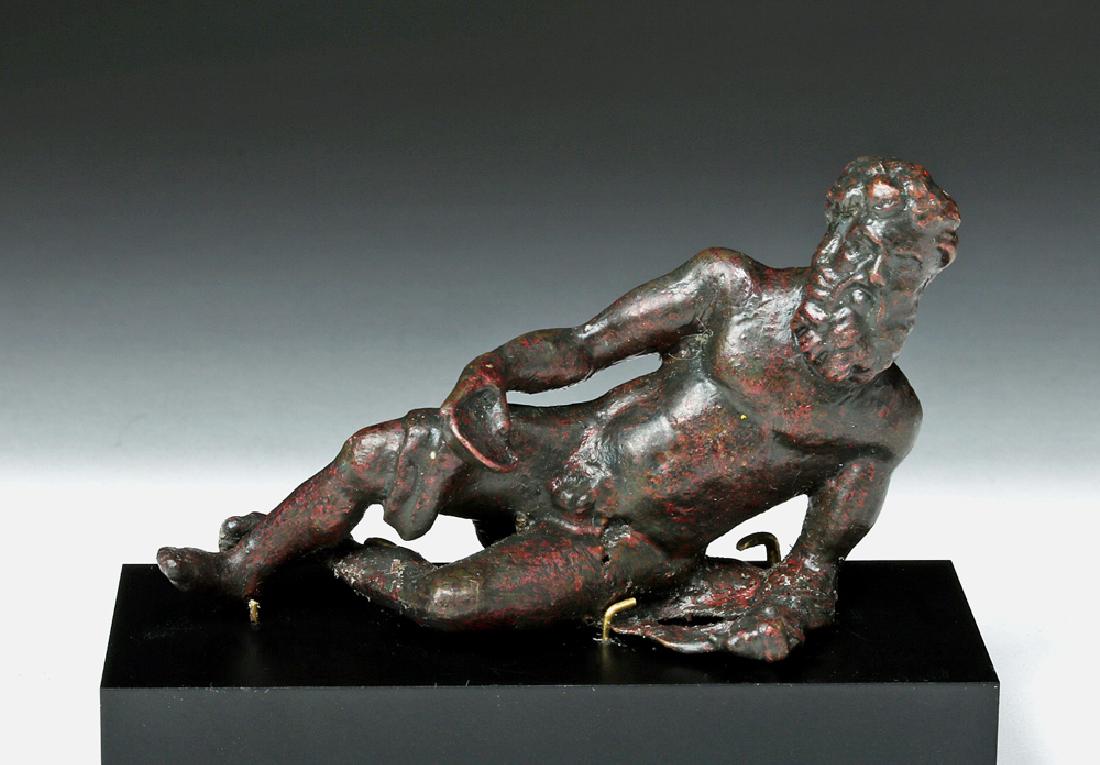Gorgeous Roman Bronze Statue - Bacchus Reclining: Roman, Imperial Period, ca. 1st century BCE. A solid, cast bronze sculpture depicting the bearded Olympian god Bacchus (Greek Dionysos or Dionysus) - god of wine, pleasure, ritual madness, ecstasy, an