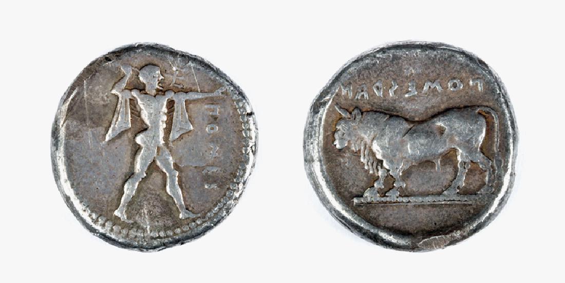 Silver Stater from Poseidonia - Lucania: Italy, Lucania, Poseidonia, 470 to 445 BCE, AR stater, 8.0 grams. OBVERSE: Poseidon advancing right, wielding trident. REVERSE: Bull standing left; below, Greek inscription above; all within circular 
