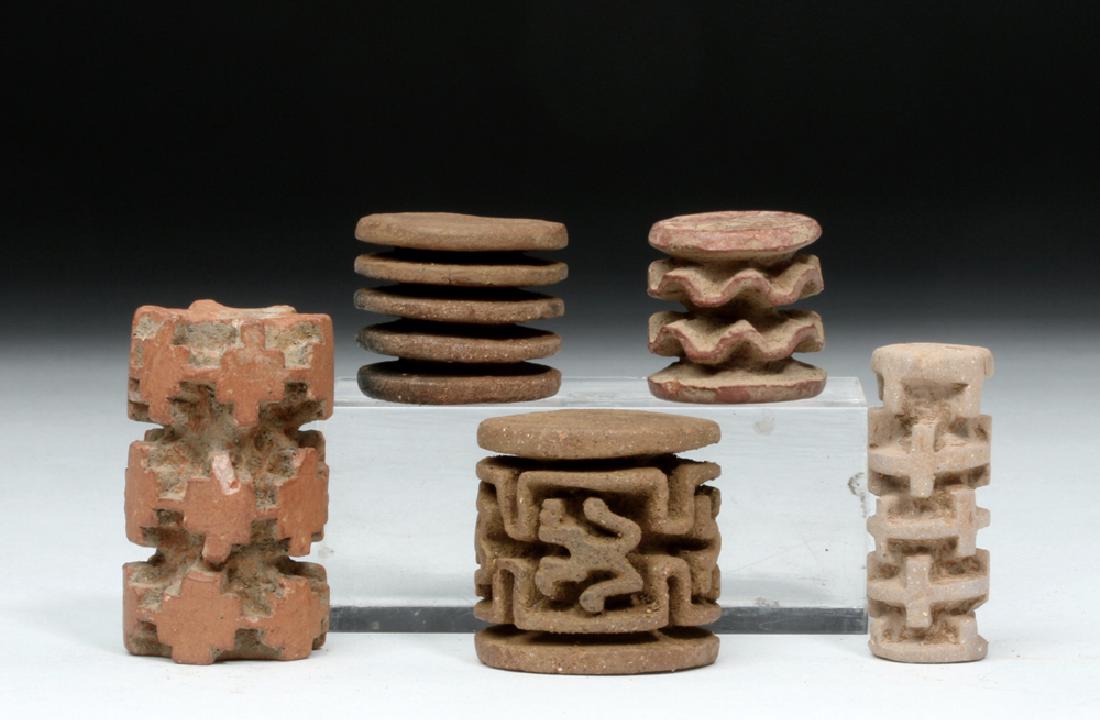 Lot of 5 Ancient Colombian Pottery Roller Stamps: **Originally Listed At $200** Pre-Columbian, Colombia, Middle Cauca, ca. 1000 to 1500 CE. An intriguing group of cylindrical terracotta roller stamps, each one carved/modeled with a mesmerizing design