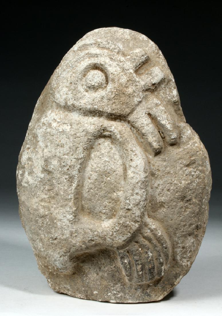 large Mayan Stone Monument - Bird Form: Pre-Columbian, Mayan Territories, ca. 550 to 900 CE. A large stone monument carved to depict an avian/deity in deep relief with nice remains of white pigment on the surface. When viewed from one direc