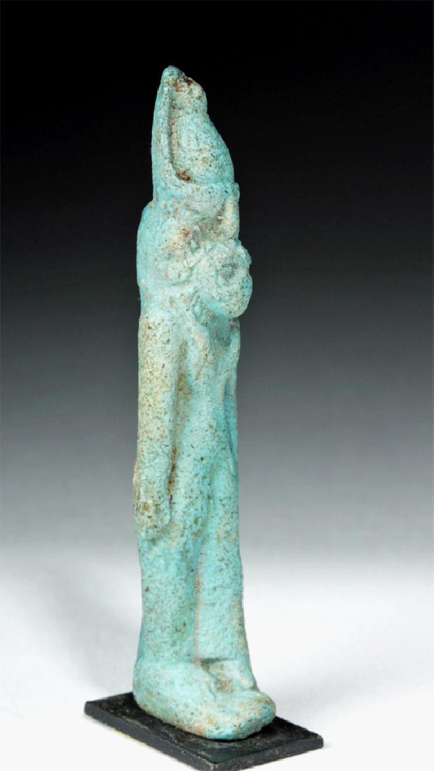 Egyptian Faience Amulet of Sekhmet: **Originally Listed At $300** Egypt, Late Dynastic Period, ca. 664 to 332 BCE. A standing blue-green glazed faience figure of Sekhmet, the lioness-headed goddess of strength and warfare. Depicted in a