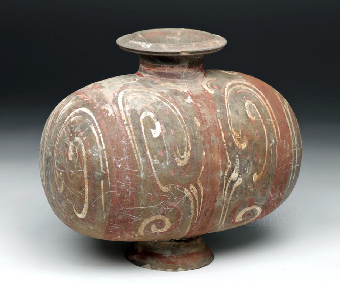 Chinese Han Dynasty Pottery Cocoon Vase: East Asia, China, Western Han Dynasty, ca. 206 BCE to 220 CE. A handsome polychrome cocoon vase presenting a traditional egg-shaped, footed form with a flared spout rising from the center of the upper
