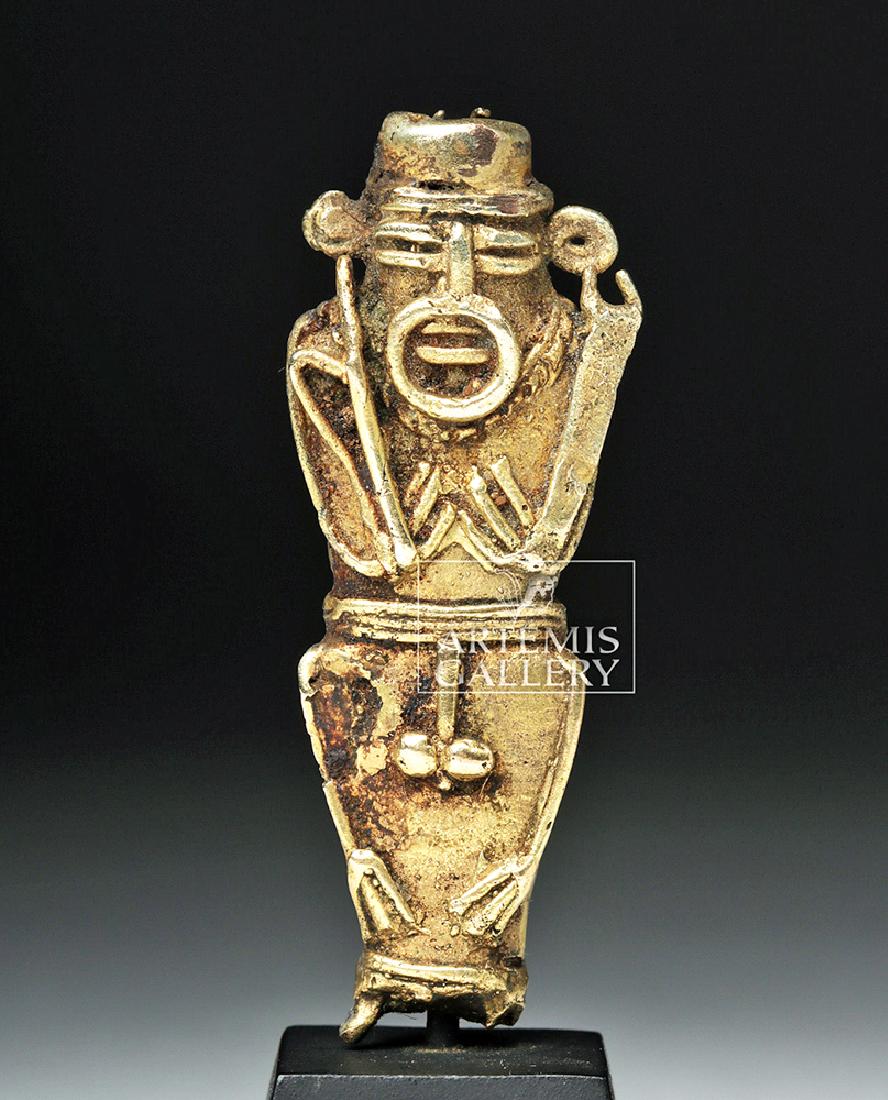 Muisca 10K Gold Male Fertility Figure (Tunjo) - 9.7 g: Pre-Columbian, South America, Colombia, Muisca, ca. 1000 to 1550 CE. Expertly cast via the lost wax (cire perdue) process, a 10K gold stylized nude male figure presenting details of his face, arms, ge