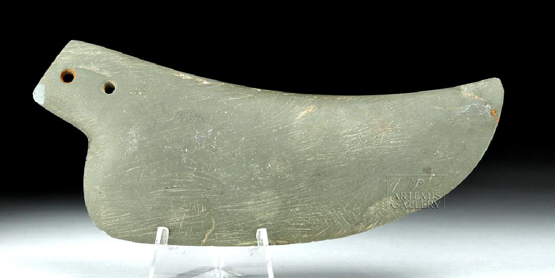 Egyptian Pre-Dynastic Slate Ceremonial Knife Blade: Ancient Egypt, Pre-Dynastic Period, late Naqada II to early Naqada III, ca. 3500 to 3100 BCE. A gorgeous curved blade with a perforated tang, hand-carved from a single piece of siltstone (commonly kno