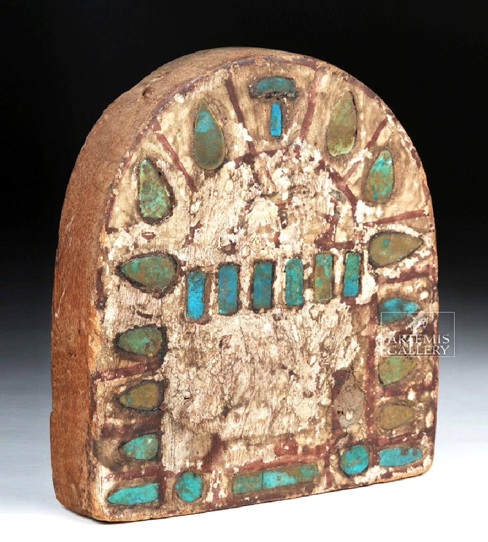 Egyptian Wooden Painted Panel with Inlaid Faience: Ancient Egypt, Late Period to Ptolemaic, ca. 712 to 30 BCE. A wooden decorative panel, perhaps from a temple or elite private residence, in the form of an arch-shape with its surface painted white. In