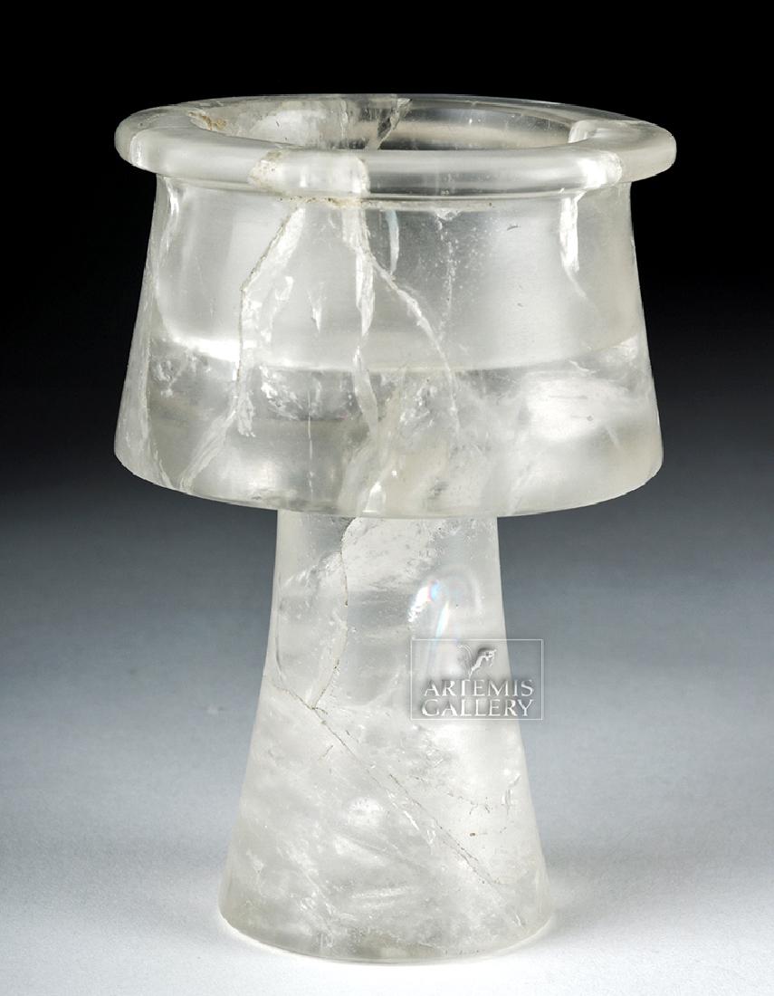 Gorgeous Bactrian Rock Crystal Goblet: Central Asia, Bactrian period, ca. 1st millennium BCE. An absolutely gorgeous goblet, composed of nearly clear rock crystal, its interior beautifully filled with stable fractures, creating rainbow pri