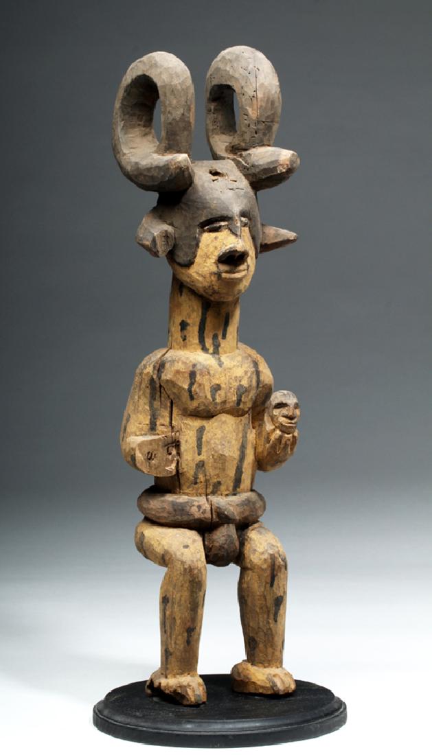 African Wood Figure of Man Wearing Antelope Horns (1 of 5)