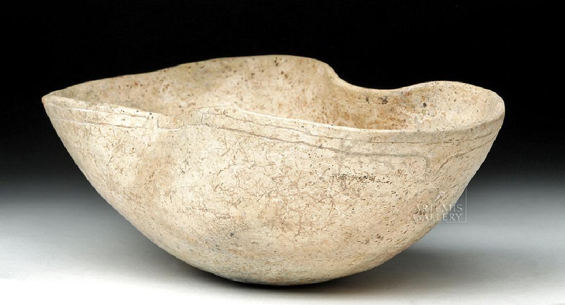 Olmec Kaolin Kidney-Shaped Bowl - TL Tested: Pre-Columbian, Southern Mexico to Guatemala, Olmec culture, ca. 1150 to 550 BCE. A rare example of a kidney-shaped bowl, made from red clay with a white slip over its surface. Around its upper exterio