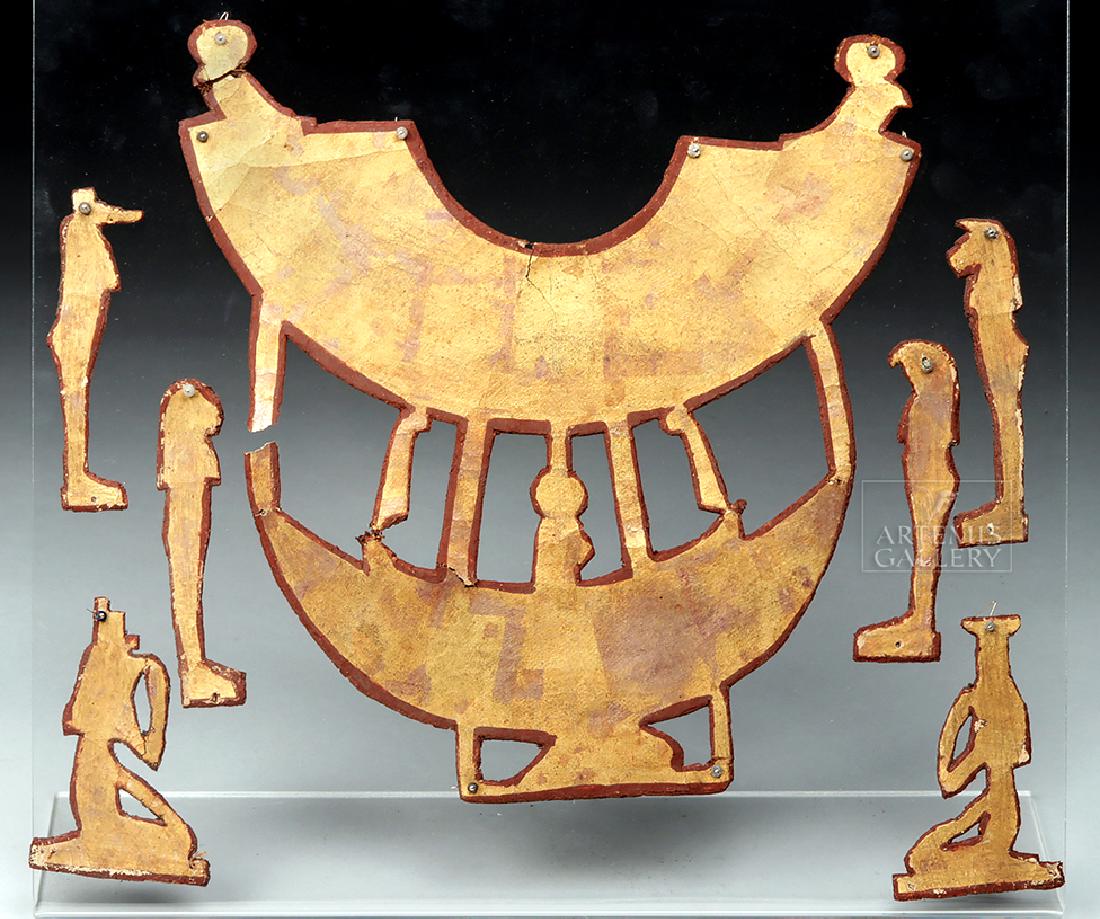 Egyptian Gilded Cartonage Mummy Pectoral Ensemble: Ancient Egypt, Ptolemaic period, ca. 332 to 30 BCE. Elaborate, gilded cartonnage openwork panels from a mummy's cartonnage. This includes a large pectoral section and six profile god and goddess figur