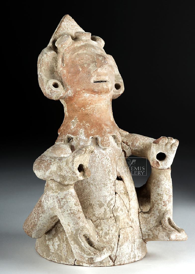 Nahua Pottery Anthropomorphic Xantil Censer Cover: Pre-Columbian, Mexico, Tehuacan Valley, Nahua culture, Post-Classic period, ca. 1200 to 1521 CE. An interesting pottery effigy censer lid, mold-formed and finely detailed, depicting a stylized anthrop
