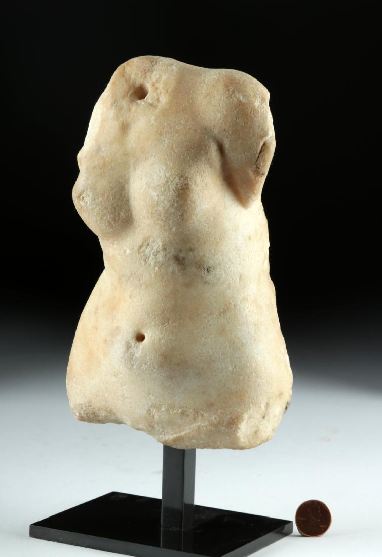 Roman Marble Torso of Venus, ex-Bonhams: Roman, Imperial Period, ca. 1st to 2nd century CE. A beautifully-carved marble sculpture of a youthful feminine body representing Venus (Greek Aphrodite), the goddess of love, beauty, pleasure, and pr