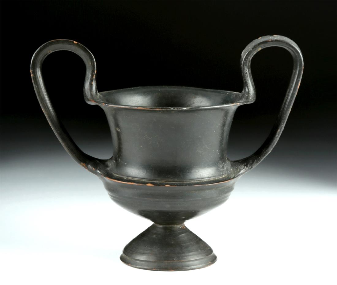 Lovely & Near Choice Greek Pottery Kantharos: Magna Graecia, either Campania or Boeotia, ca. early 4th century BCE. Unusual pottery wine drinking cup in a form that seems to mimic examples commonly found in the Greek area of Boeotia, the Etruscan