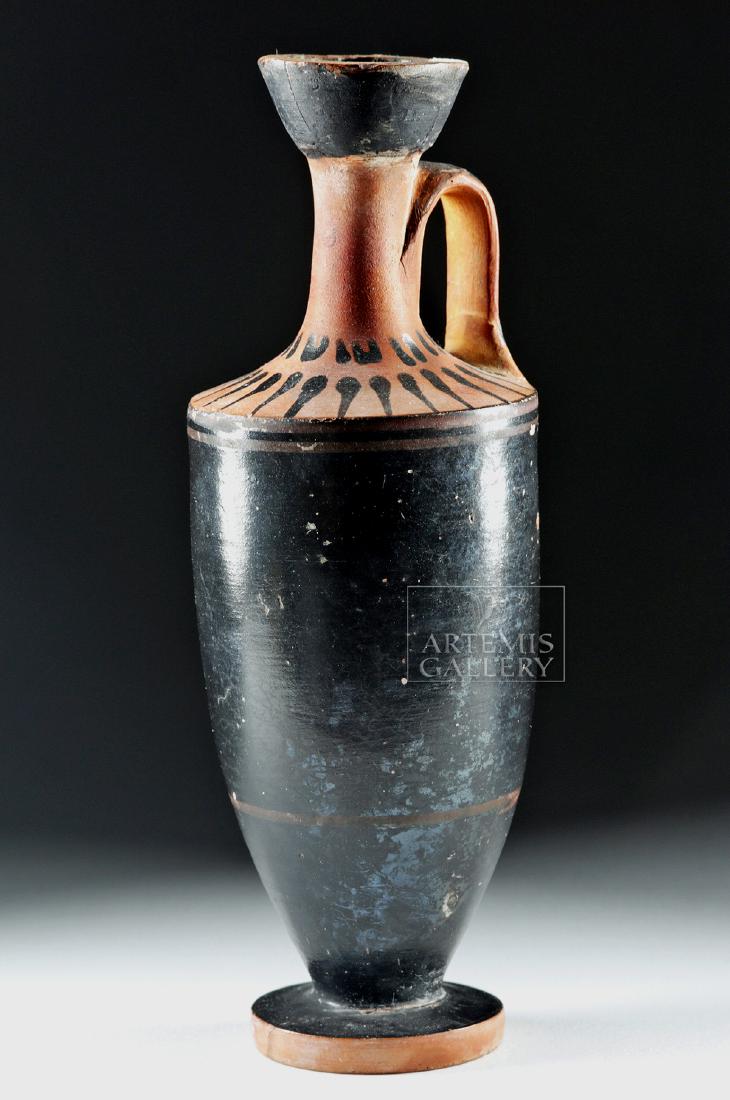 Greek Attic Black-Glazed Lekythos: Ancient Greece, Athens (Attic), ca. late 6th to early 5th century BCE. A finely-modeled, wheel-thrown pottery lekythos - a vessel used to store scented oils or other perfumes - in black-figure. A lust