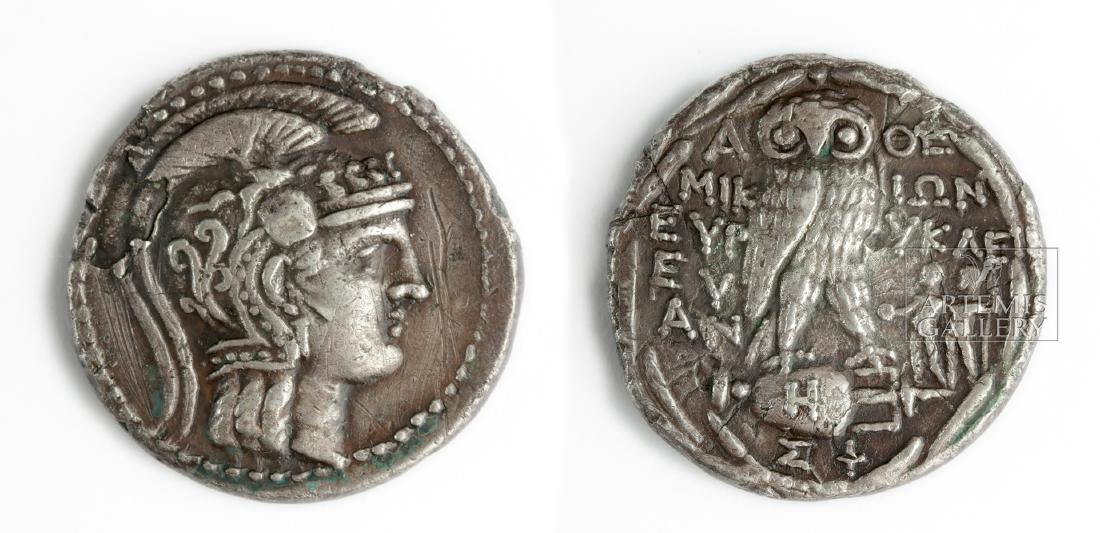 Attic Athena Silver Tetradrachm - New Style - 16.9 g: Greece, Attica, Athens, ca. 186 to 86 BCE. Obverse: Helmeted head of Athena right. Reverse: Greek inscription on either side of owl standing facing on amphora, Dioscuri standing left, to right. "H" on