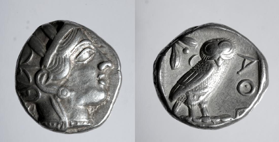 Greek Athenian Silver Tetradrachm Owl Coin - 17 g: Greece, Athens, ca. 449 to 413 BCE. A beautiful silver Athenian tetradrachm with Athena and Owl. Obverse: Helmeted head of Athena with olive leaves and spiraled palmette. Reverse: Standing owl with ol