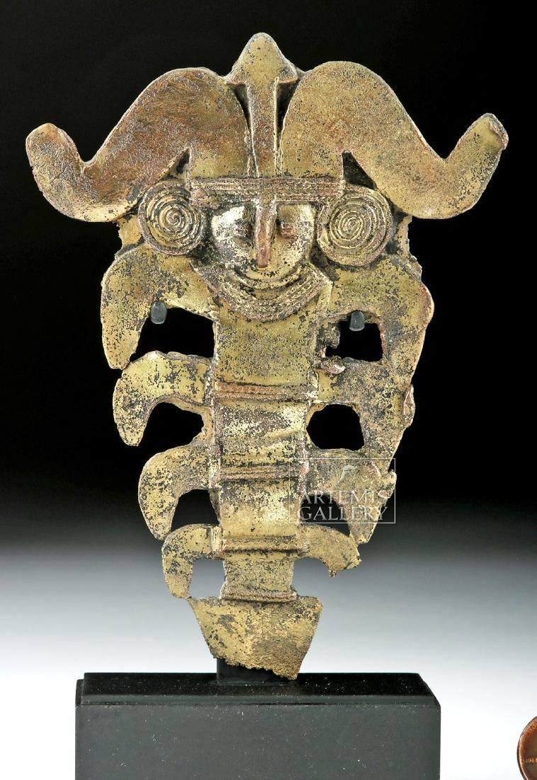 Tairona Tumbaga Ornament - Transformative Figure: Pre-Columbian, Colombia, Tairona, ca. 10th to 16th century CE. A wonderful tumbaga transformative figure - his body assuming the form of a sea crustacean, abstract yet representational at the same tim