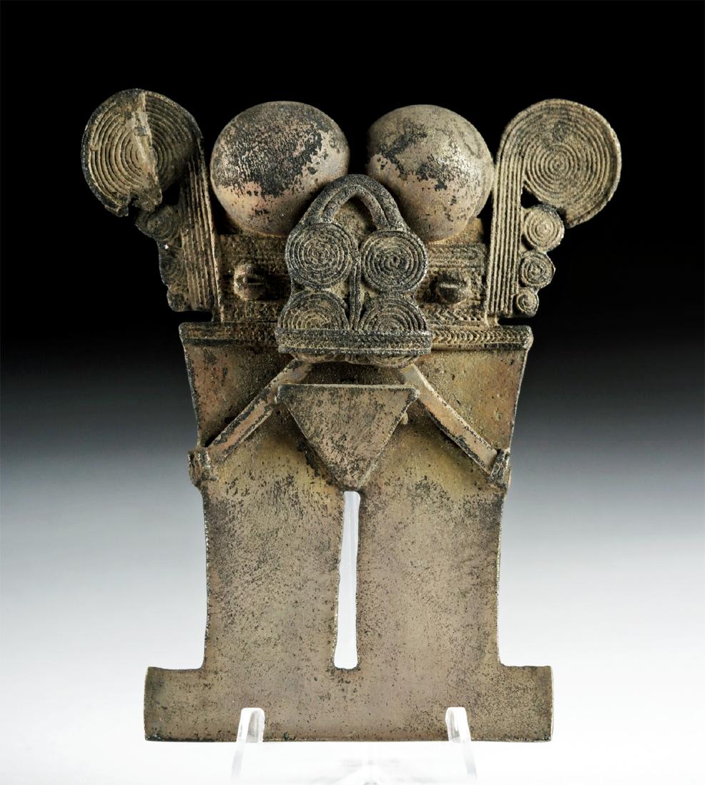 Colombian Tumbaga Ornament - Zoomorphic: Pre-Columbian, Colombia, Tairona culture, ca. 1200 to 1500 CE. A beautiful tumbaga (alloy of gold and copper) ornament with a highly abstract zoomorphic design with tightly coiled swirling designs mad