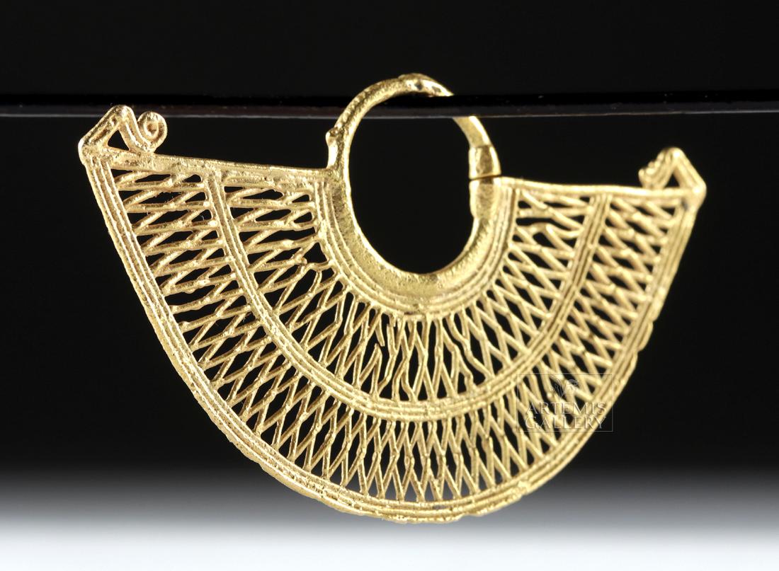 Single Sinu Gold Filigree Crescent Earring - 5.5 grams: **First Time At Auction** Pre-Columbian, Colombia, Sinu, ca. 10th to mid 16th century CE. Finely crafted from 67% gold (equivalent to 15K+), this crescent shaped earring was cast via the lost wax (cir