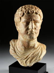 Impressive Roman Marble Bust of Caracalla: Roman, Imperial period, ca. 212 to 217 CE. A detailed portrait bust of Emperor Caracalla (formerly Antoninus who ruled from 198 to 217 CE), expertly carved from marble of cream hues with a marvelous r