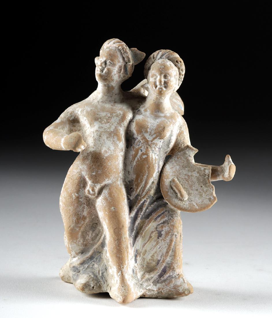 Canosan Terracotta Eros & Psyche Arm in Arm: Magna Graecia, Canosan, ca. 4th to 3rd century BCE. Standing arm in arm and striding forward, a lovely molded terracotta statue of the romantic lovers Eros (Roman Cupid) and Psyche - the winged Eros d