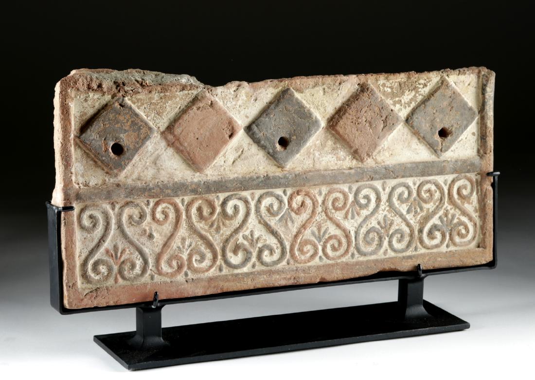 Rare Lydian Polychrome Wall Frieze: Ancient Near East, western Anatolia (Turkey), Lydia, ca. 6th century BCE. A very rare polychrome pottery panel with repeating scrolls at the top in alternating red and black, and a lower section of re