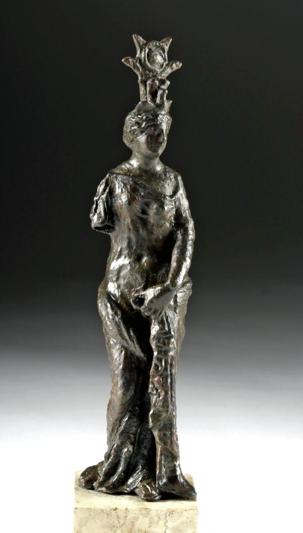 Stunning Roman Bronze Statue of Venus: Roman, Imperial Period, ca. 1st to 2nd century CE. A beautiful cast-bronze statue of Venus (Greek Aphrodite) as Isis shown standing in an elegant pose with one hand holding the excess of her flowing c