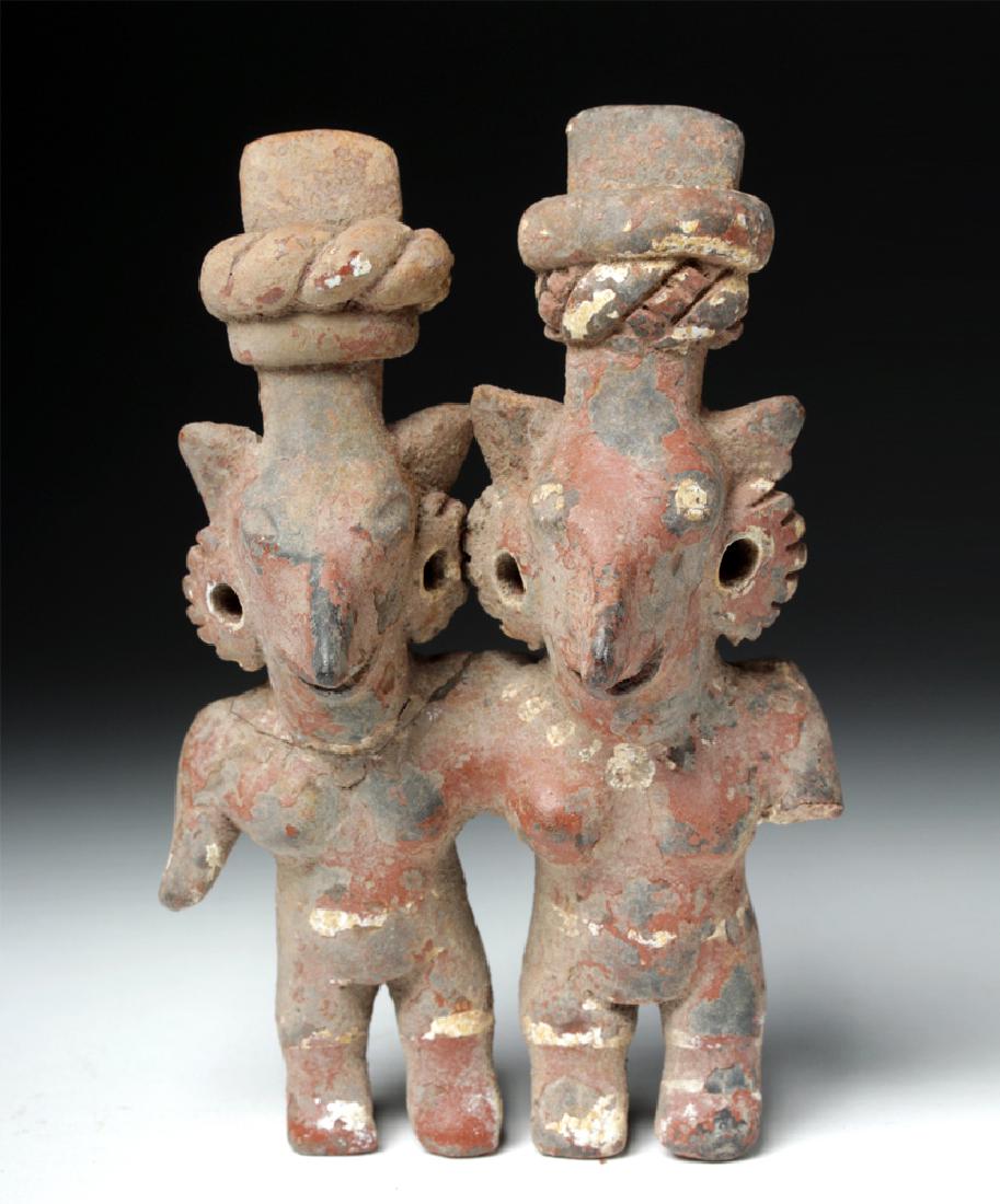 Rare Jalisco Conjoined Female Twins: **Originally Listed At $250** Pre-Columbian, West Mexico, Jalisco, ca. 300 BCE to 300 CE. A pretty hand-molded pottery sculpture showing a pair of conjoined, standing women. Their bodies are painted d