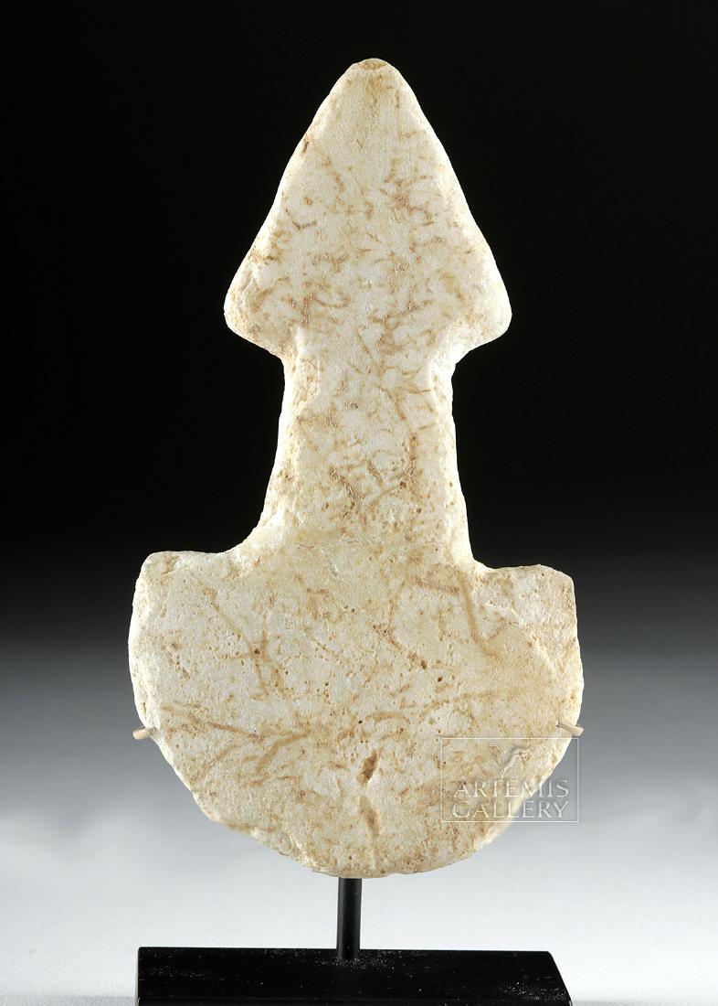 Fine Anatolian Kusura Marble Idol w/ Triangular Head: Ancient Near East, Anatolia, Early Bronze Age II, ca. 2700 to 2300 BCE. A lovely Kusura-type idol of an extremely simplified anthropomorphic form, hand-carved from creamy yellow-white marble. The figu
