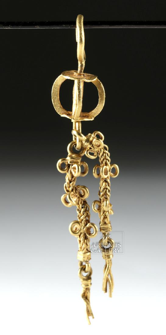 Ancient Parthian 22K+ Gold Earring - 10.1 grams: Ancient Near East, Parthia, ca. 2nd to 3rd century CE. A single gold earring comprised of 95% gold (equivalent to 22K+), the design composed of an upper circular loop attached to a rod around which is