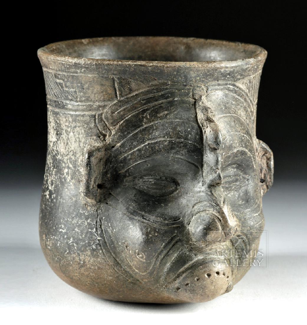 Maya Pottery Vessel with Old God of Fire: Pre-Columbian, Central America, Guatemalan Highlands, Chajcar, Late Classic Period, ca. 550 to 900 CE. A mold-formed ceramic vessel with a flat base, tall walls, a lightly-flared rim, and a deep inter