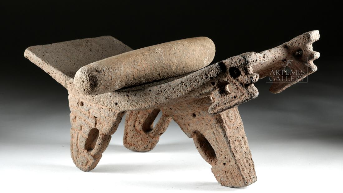 Fine Costa Rican Stone Metate & Mano: Pre-Columbian, Central America, Costa Rica, Atlantic Watershed, ca. 800 to 1200 CE. A skillfully-detailed metate and mano set, both hand-carved from porous volcanic stone, the metate standing upon thr