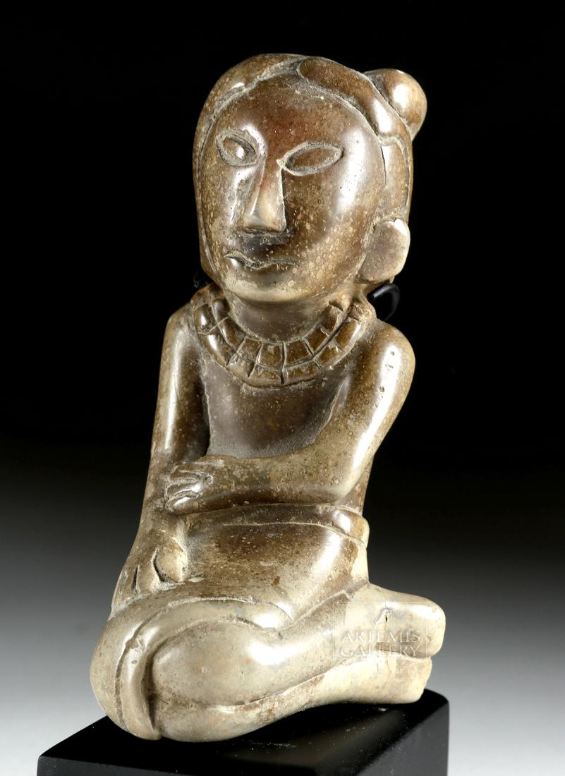 Published Hopewell Indian Stone Seated Female Effigy: Native American, central/eastern United States, Hopewell Indians, ca. 100 BCE to 500 CE. A beautiful Hopewell female effigy, hand-carved from mottled grey stone with beige, brown, and russet inclusion