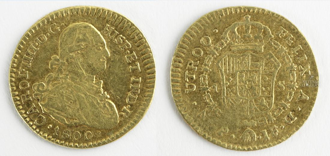 Colombian Carlos IIII Escudo Gold Coin - 1800: New World, Colombia, ca. 1800 CE. A well-preserved example of a gold coin from the reign of the Spanish king Charles IIII (reigned 1788-1808) from Colombia. One side shows a bust of the king, the othe