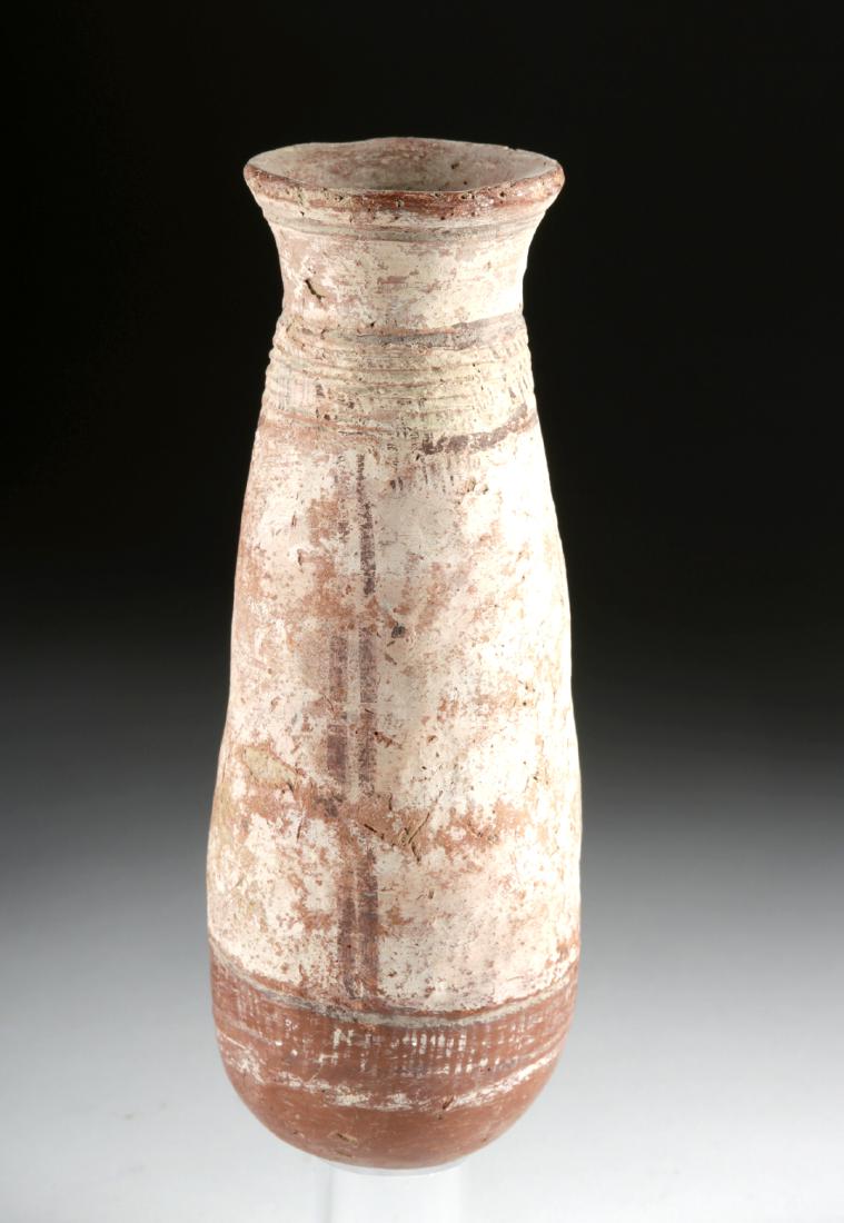 Predynastic Egyptian Painted Pottery Alabastron: Ancient Egypt, Pre-Dynastic period, Naqada II to Naqada III, ca. 3500 to 3000 BCE. A lovely hand-built pottery alabastron, so-named because most ancient vessels that assumed this form were carved from